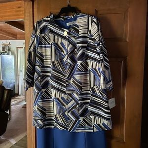 A 2 piece dress with coat size 12. NWT